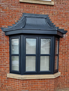 Bay window painted in grey