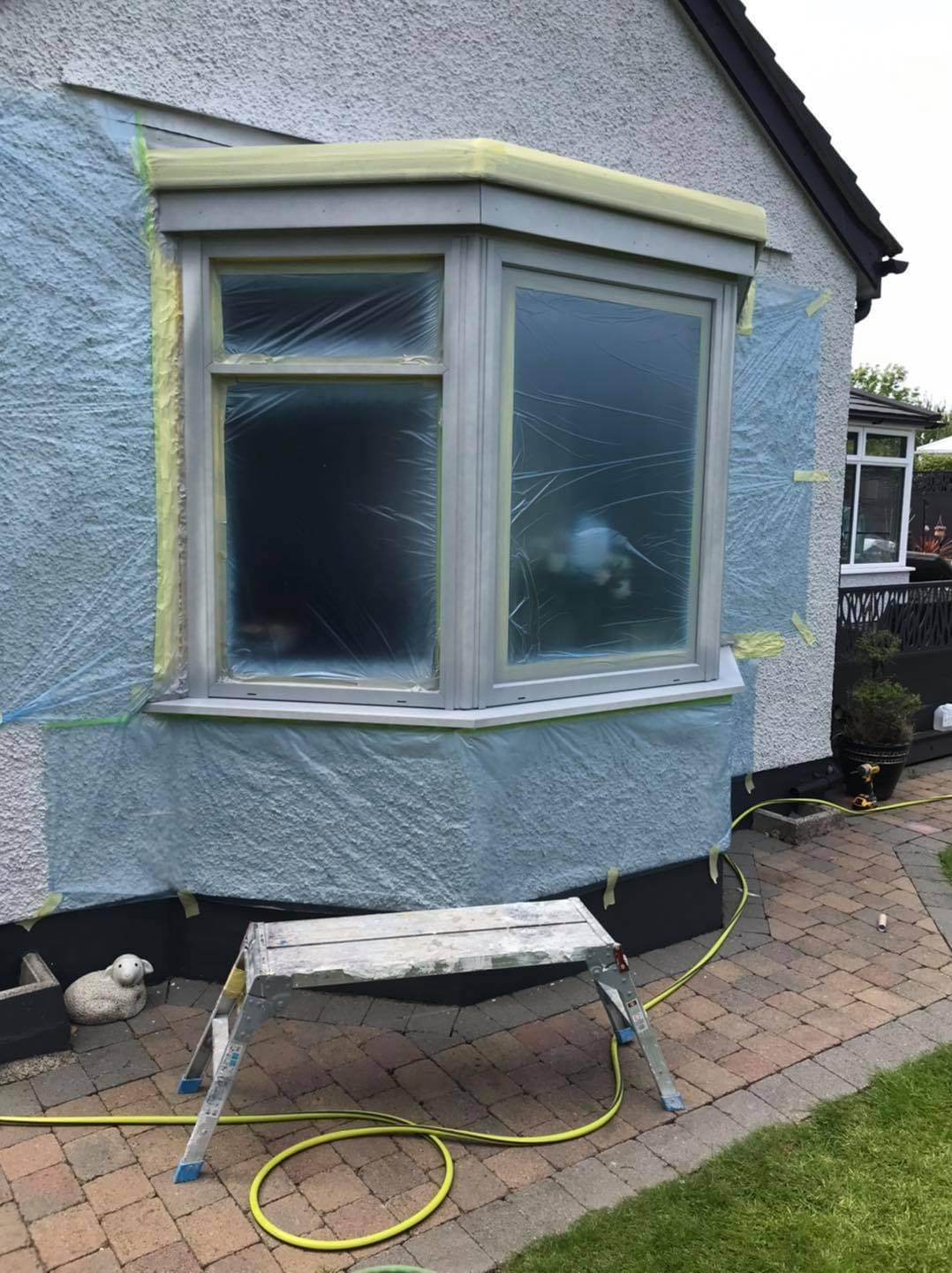 Bay window with UPVC spray paint covered in protective film