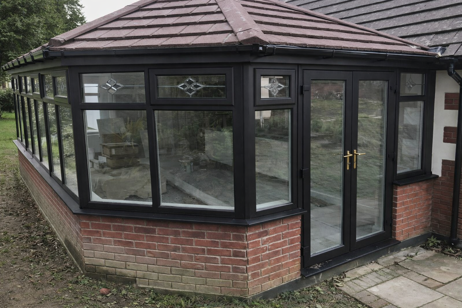 Conservatory windows sprayed in a black UPVC paint colour